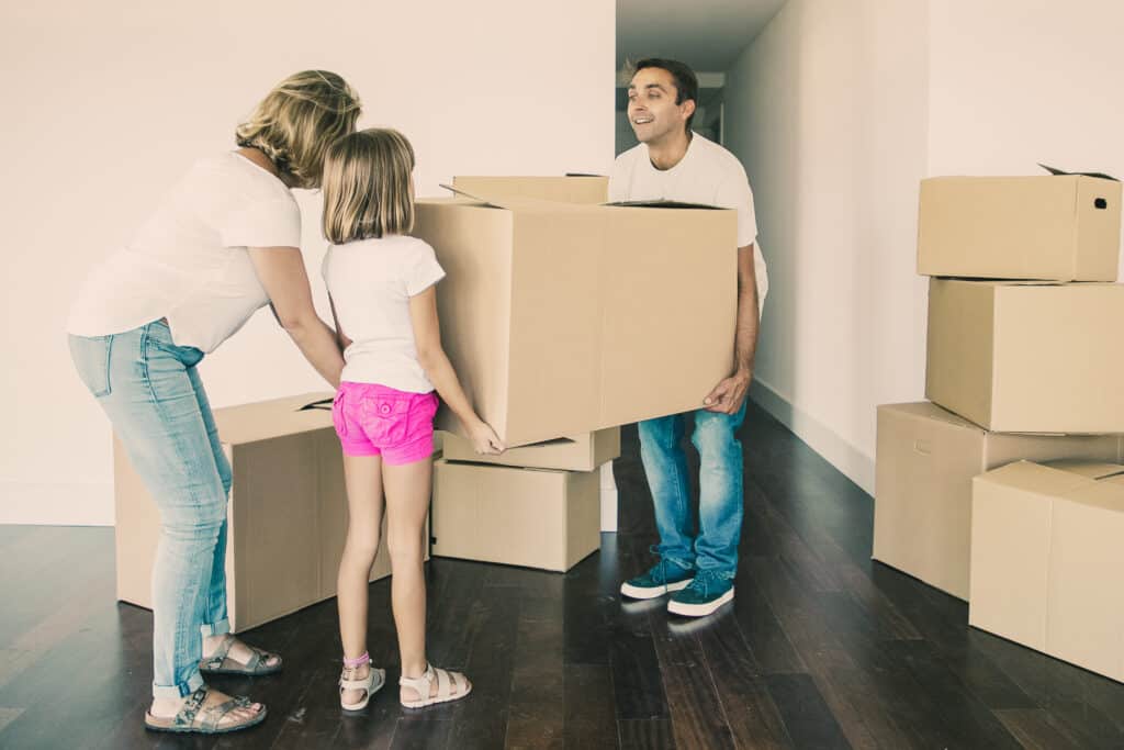 Efficient Dunbar Moving services with a family loading cartons for a smooth move.
